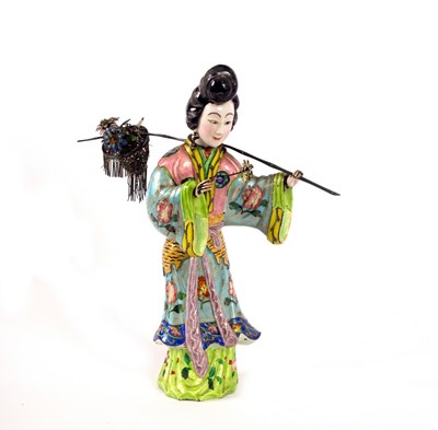 Lot 552 - A Chinese export silver and enamel figure of a...