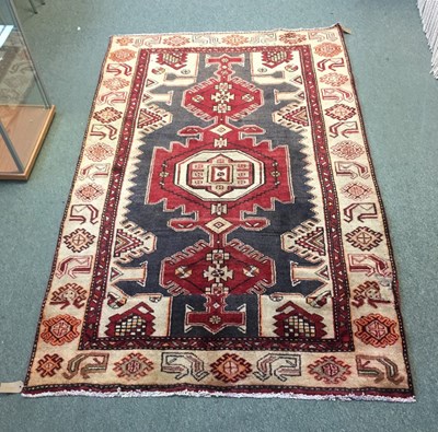 Lot 687 - An Ardabil rug, the grey ground with red...