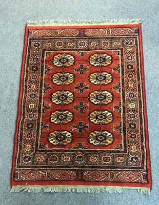 Lot 694 - A machine made rug of Bokhara design, 125cm x...