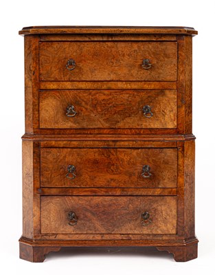 Lot 203 - A miniature walnut chest on chest