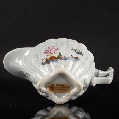 Lot 868 - A Worcester fluted creamboat, circa 1752-53,...