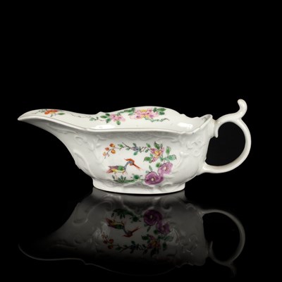 Lot 871 - A Worcester low-footed sauceboat, circa 1753,...