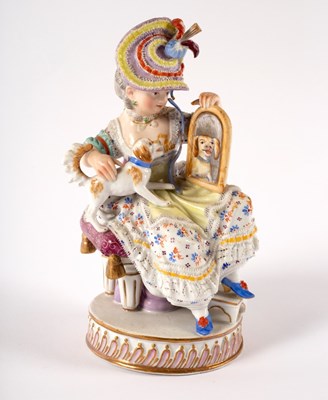 Lot 908 - A Meissen figure, emblematic of sight, 15cm high