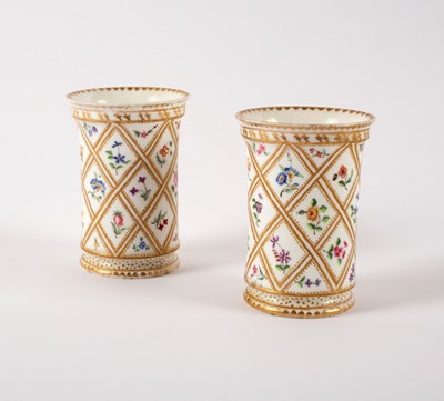 Lot 910 - A pair of 19th Century porcelain spill vases,...