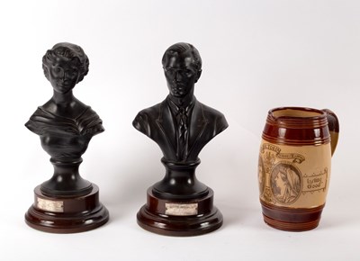 Lot 958 - A pair of Wedgwood black basalt busts of the...