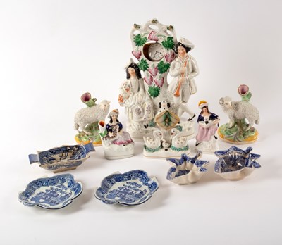 Lot 959 - A group of Staffordshire figures including a...