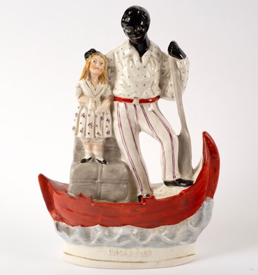 Lot 964 - A named Staffordshire figure of Uncle Tom,...