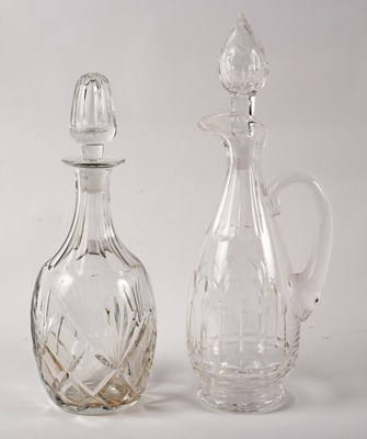 Lot 991 - Two cut glass decanters, the largest 35cm high