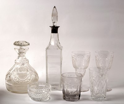 Lot 997 - Two cut glass decanters, one with a silver...