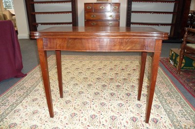 Lot 1050 - A George III style mahogany card table of...