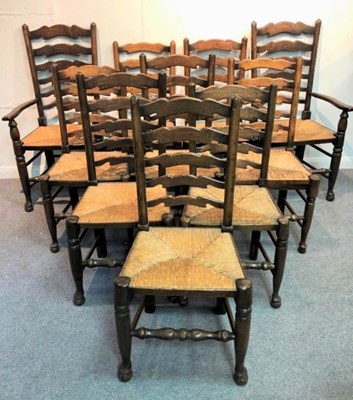 Lot 1056 - A set of ten ash and elm ladder back dining...