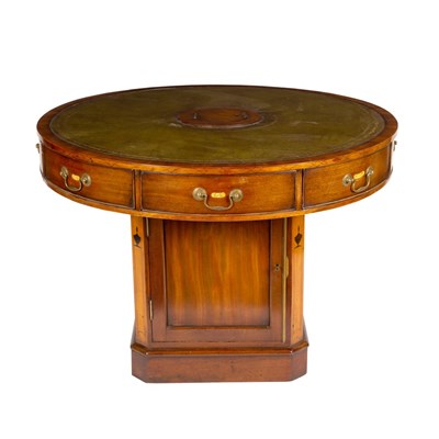 Lot 1067 - A mahogany drum-shaped rent table, circa 1920,...