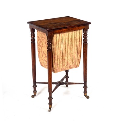 Lot 1098 - A mid 19th Century rosewood work table with...