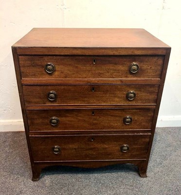 Lot 1108 - A George III mahogany chest of four long...