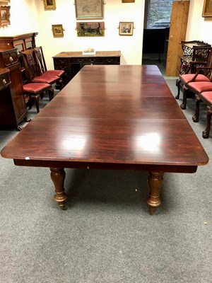 Lot 1111 - A Victorian mahogany extending dining table,...