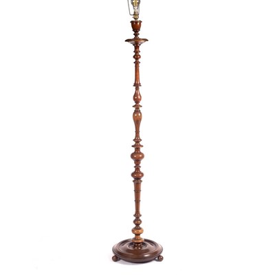 Lot 1137 - A standard lamp of turned form on a circular...