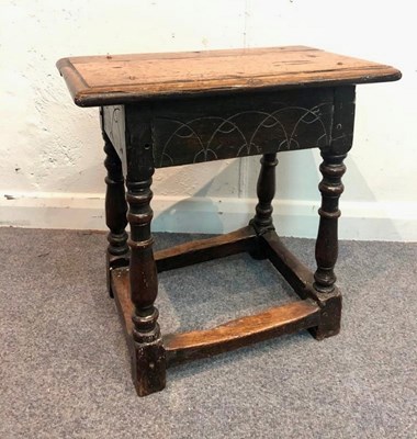 Lot 1150 - An 18th Century oak joint stool on baluster...