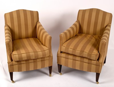 Lot 1178 - A pair of armchairs upholstered in striped...