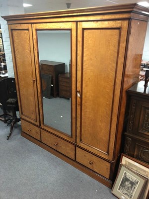 Lot 1195 - A large Victorian satinwood wardrobe by...