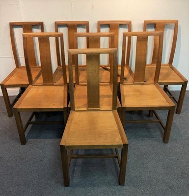 Lot 1196 - A set of eight oak dining chairs by William...