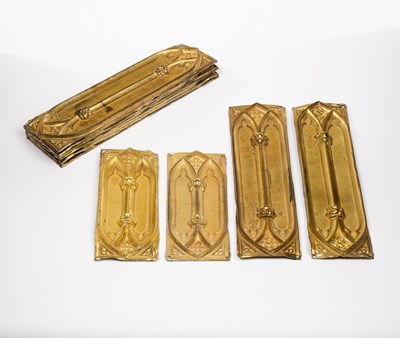 Lot 46 - Eight Victorian Gothic brass door plates with...