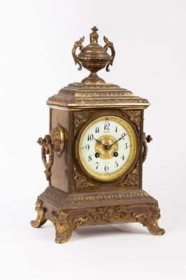 Lot 93 - A French gilt metal mantel clock with...