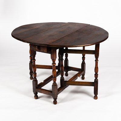 Lot 97 - An oak gateleg table of 17th Century style, on...