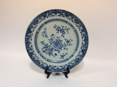 Lot 117 - An early 19th Century blue and white saucer...