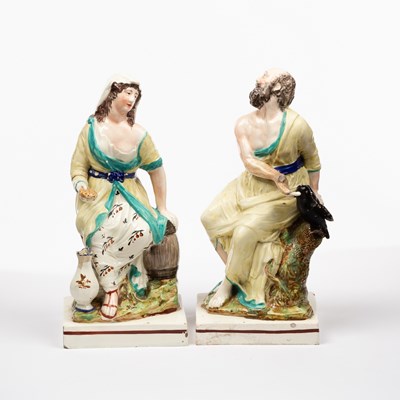 Lot 141 - A pair of Staffordshire pearlware figures of...