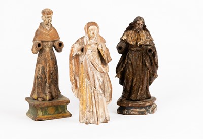 Lot 142 - A carved lime wood figure of a saint with...