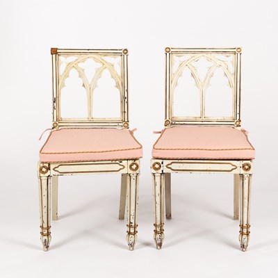 Lot 150 - A pair of Regency white and gilt painted...