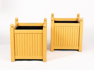 Lot 187 - A pair of ochre painted wooden square planters...