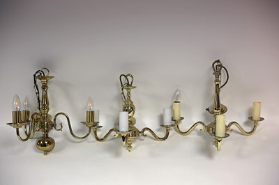 Lot 222 - A Dutch brass three-light chandelier with...