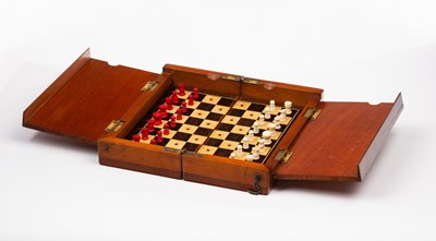 Lot 262 - A travelling chess set complete with...