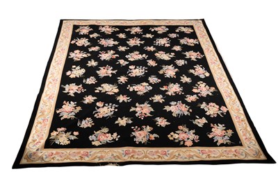 Lot 287 - An Aubusson style wool carpet decorated a...