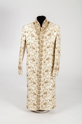 Lot 330 - An Indian ivory silk coat with boteh and...