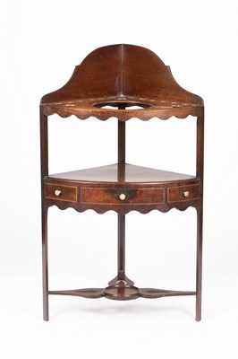 Lot 337 - A George III mahogany corner washstand fitted...