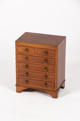 Lot 338 - A mahogany apprentice chest with inlaid...