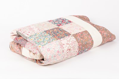 Lot 410 - A patchwork quilt of square floral panels...