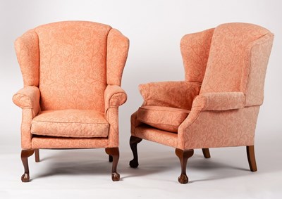 Lot 508 - A pair of Greensmith wing back armchairs on...