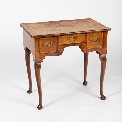 Lot 514 - A George II walnut lowboy with herringbone...