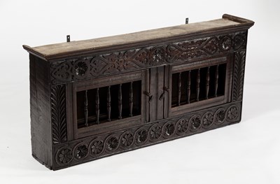 Lot 517 - A oak dole cupboard, 17th Century and later,...