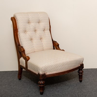 Lot 522 - A Victorian walnut button back chair on turned...