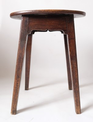 Lot 528 - An early 19th Century oak peg jointed stool,...