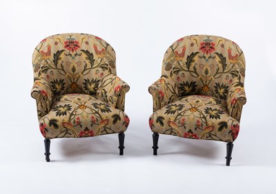 Lot 530 - A pair of upholstered tub shaped armchairs, on...