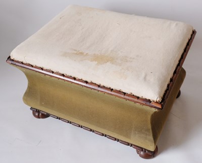 Lot 532 - A Regency waisted ottoman with clawed bun feet...