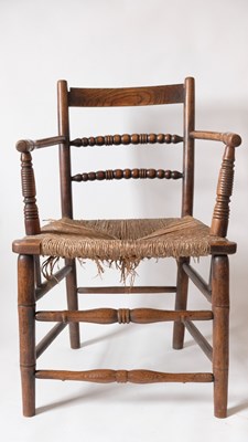 Lot 533 - A 19th Century Sussex chair in elm and ash...