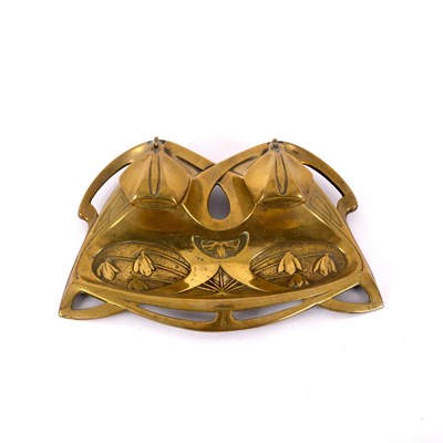 Lot 565 - A brass inkwell in the Jugendstil style,...