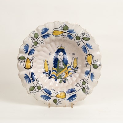 Lot 577 - A Dutch Delft Royal portrait dish, of lobed...