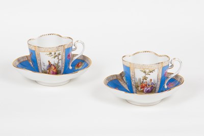 Lot 584 - A pair of Dresden cabinet cups and saucers,...